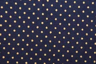 Christmas cotton fabric in dark blue with a print of small gold dots 60893/008