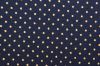 Christmas cotton fabric in dark blue with a print of small gold dots 60893/008