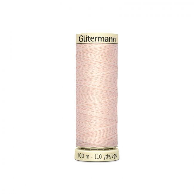 Universal sewing thread Gütermann in beige color with a hint of pink 210