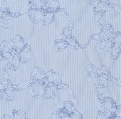 Cotton fabric with a stripe and sewn plastic flowers 22733/636
