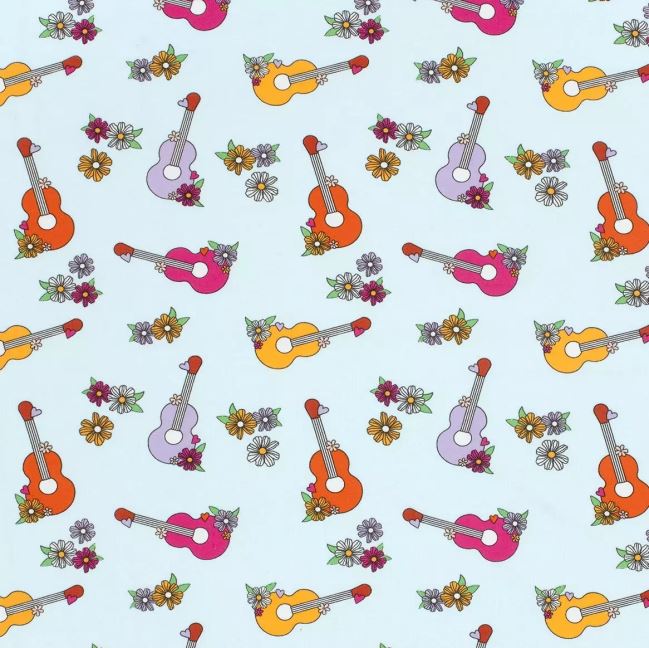 Cotton knitwear in light blue with a print of musical instruments 21814/002