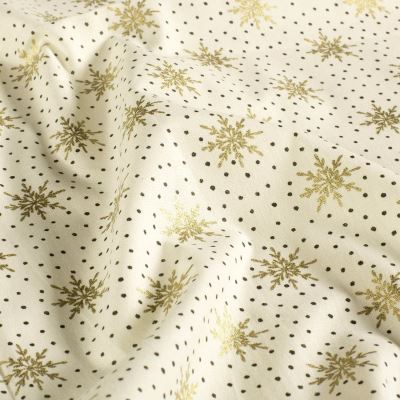 Christmas fabric made of cotton in cream color with a print of golden snowflakes 60679/051 Christmas fabric made of cotton in cream color with a print of golden snowflakes 60679/051