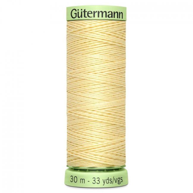 Gütermann extra strong sewing thread in dark cream color J-325