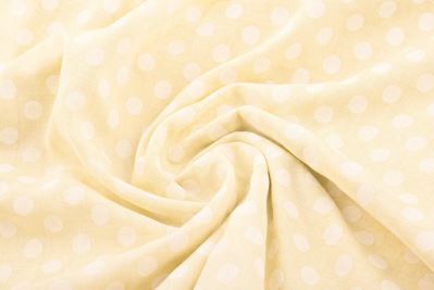 Viscose fabric in cream color with polka dot print MOR4096