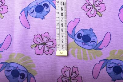 1 m of cotton knitwear in purple with fairy tale character Stitch DS-KUP146 (1)