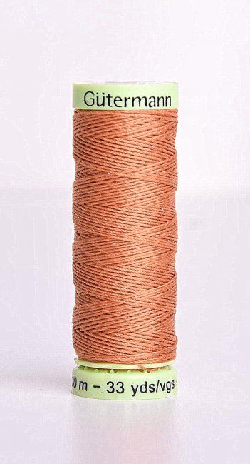 Gütermann extra strong sewing thread in light brown color J-612