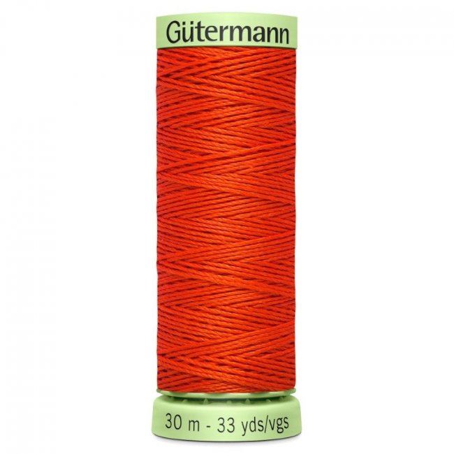 Extra strong Gütermann sewing thread in light red color J-364