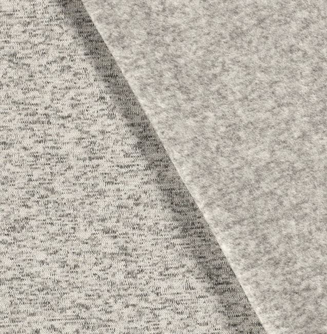 Mottled combed knitted fabric in the color of light gray mottled 03083/051