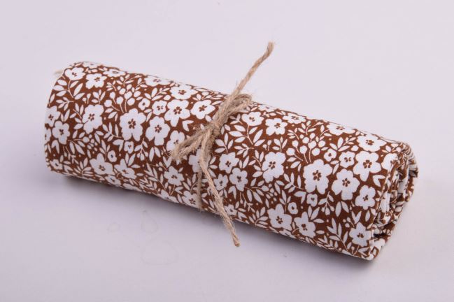 Roll of cotton knit in brown color with flower print RO18480/055
