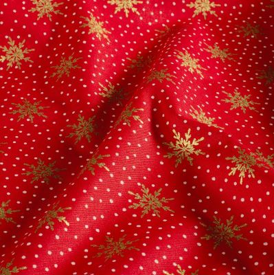 Christmas cotton fabric in red with a print of golden snowflakes 60679/015 Christmas cotton fabric in red with a print of golden snowflakes 60679/015