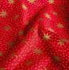 Christmas cotton fabric in red with a print of golden snowflakes 60679/015