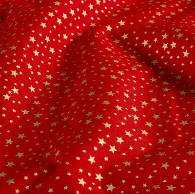 Christmas cotton fabric in red with gold star print 60895/215 Christmas cotton fabric in red with gold star print 60895/215