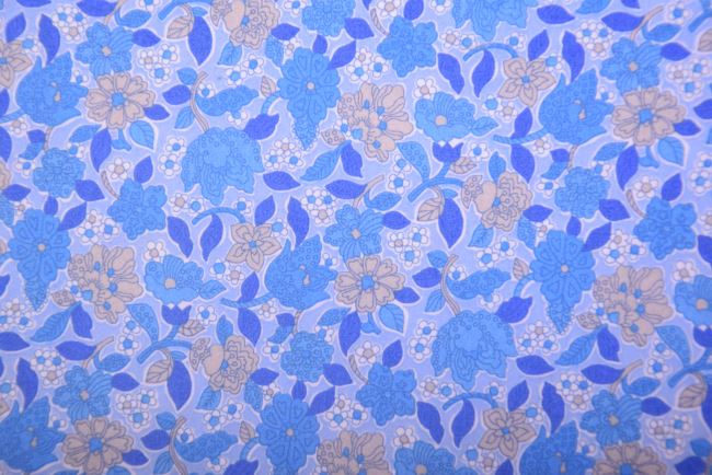 Cotton fabric in blue with a print of small flowers J10