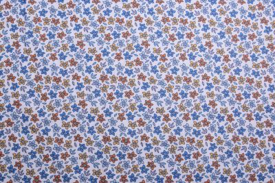 Poplin in light blue color with a decorative print of flowers 19430/002 (1)