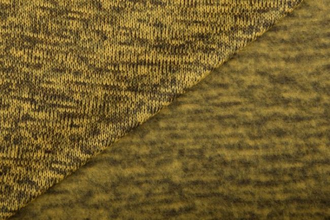 Mottled knitted fabric with a poché in yellow color 03083/034