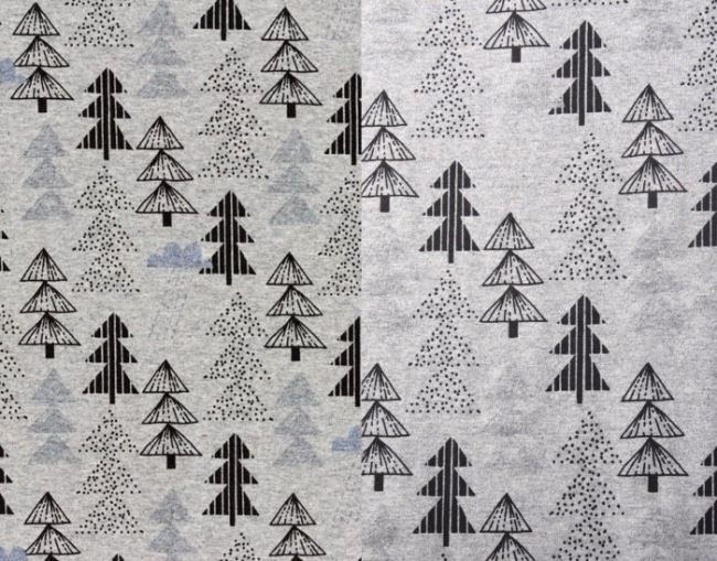 Cotton knit with a magical pattern of trees and clouds 63444