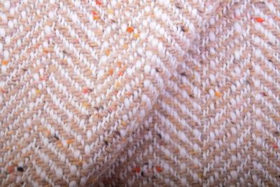 Coat fabric in beige color with zigzag pattern TI2053