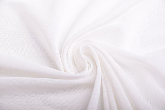 Soft elastic tulle in white color IT583