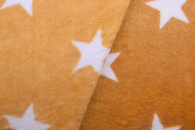 Wellness fleece in ochre color with star pattern S2458R-3682