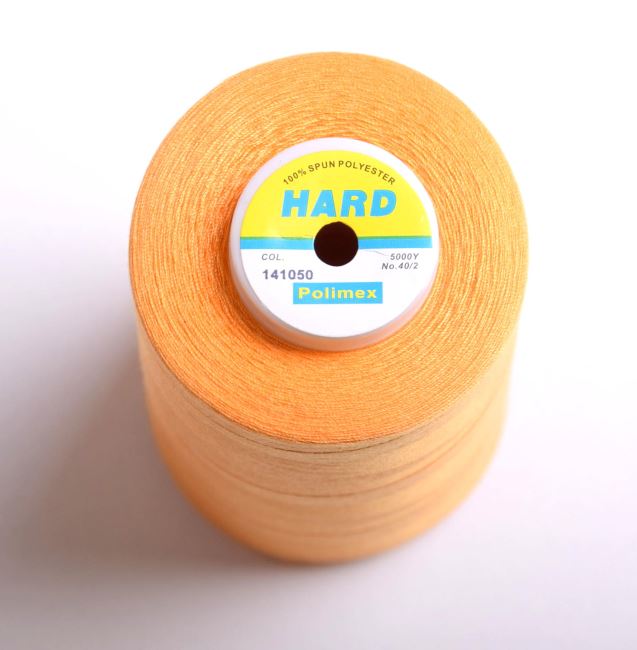 Sewing thread in light orange with a spool of 5000 yards I-N50-40-141050