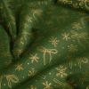 Christmas cotton fabric in green with a print of golden snowflakes 60542/027