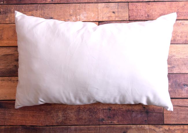 Cotton pillow with hollow fiber filling in size 50x30 cm POV2