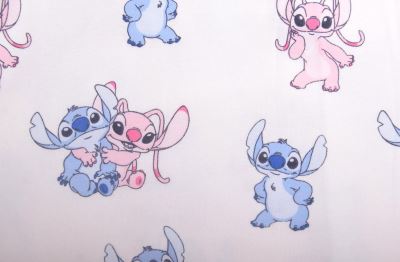1 m of cream-colored cotton knit with fairy tale character Stitch DS-KUP125