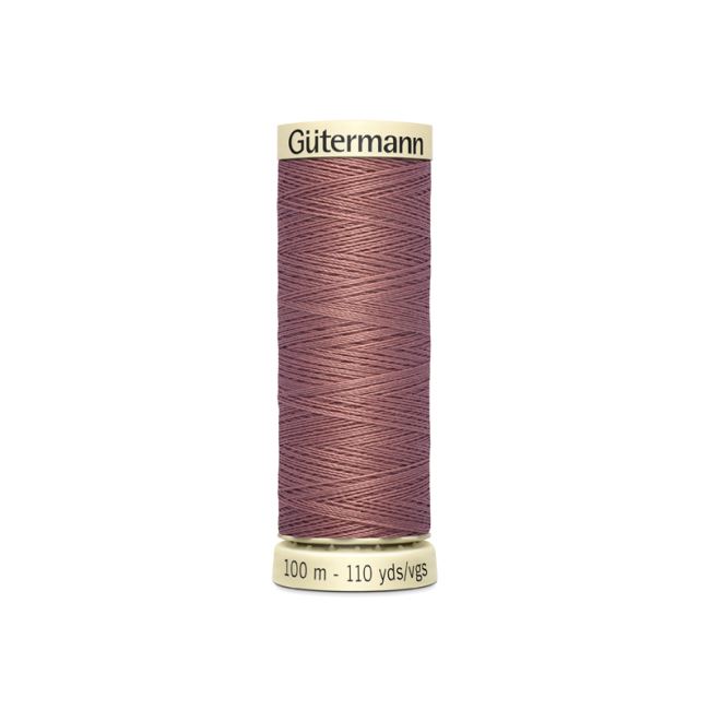 Universal sewing thread Gütermann in dark coral color 844