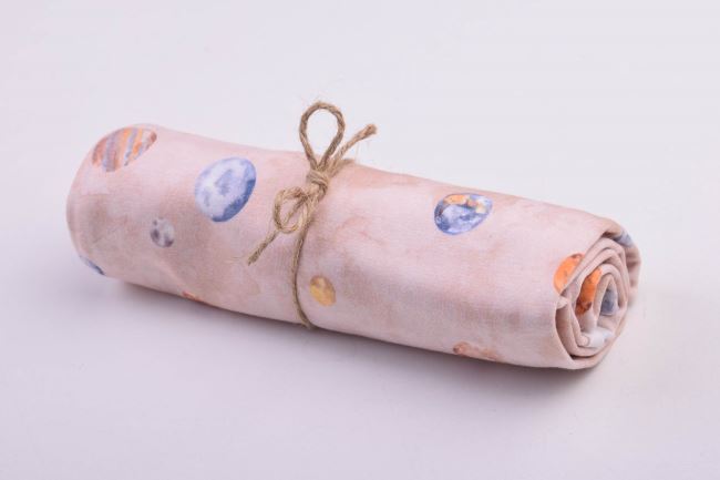 Roll of cotton knit in beige color with planet print RO18939/052