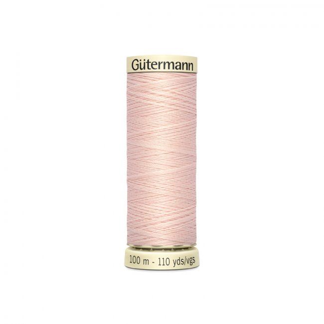 Universal sewing thread Gütermann in beige with a touch of pink 658