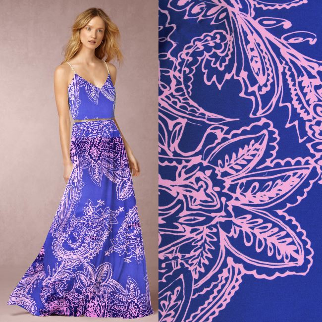 Elastic satin in blue with a print of TF1000 ornaments