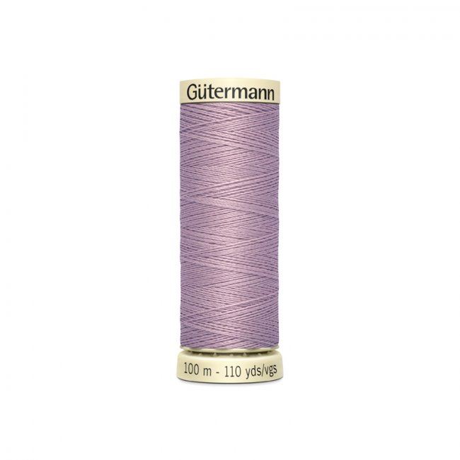 Universal sewing thread Gütermann with a purple tint 568