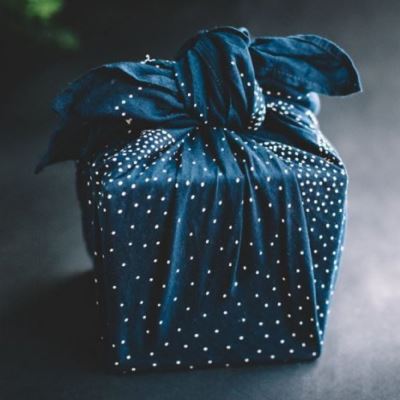 Original wrapped gifts in pieces of fabric Original wrapped gifts in pieces of fabric