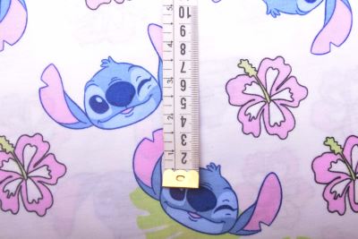 1 m of cotton knitwear in white with fairy tale character Stitch DS-KUP147 (1)