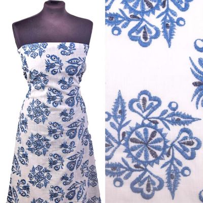 Cotton fabric with embroidered blue flowers 21518/690 Cotton fabric with embroidered blue flowers 21518/690
