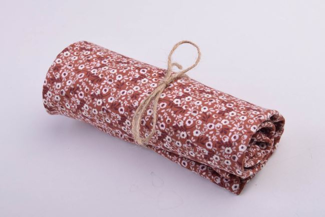 Roll of cotton knit in brown color with flower print RO19559/056