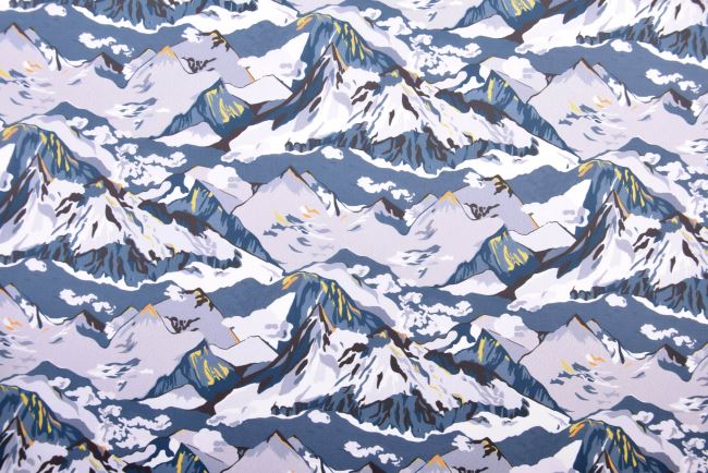Fabric in blue with a print of snowy mountains TF203