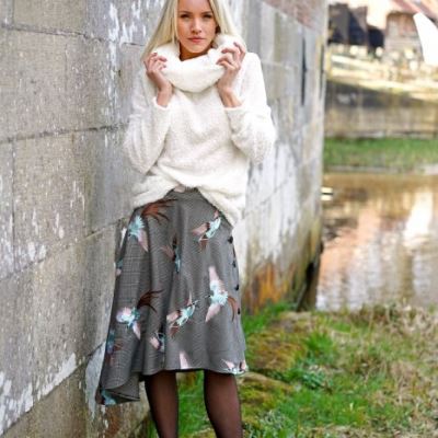 Autumn checkered skirt with birds. Autumn checkered skirt with birds.