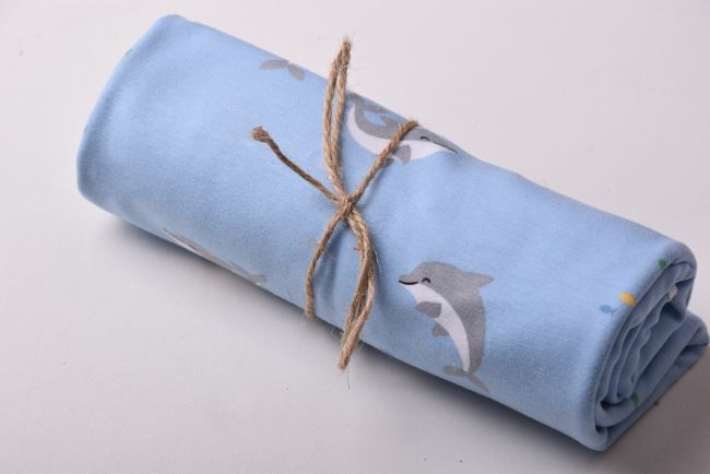 Roll of cotton knit in blue color with dolphin print RO19578/003