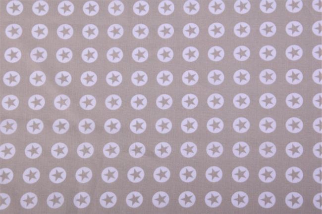 Cotton beige fabric with a print of stars and dots 9302/052