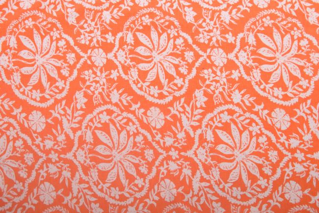 1 m of viscose knitwear in orange with flower print KUP20