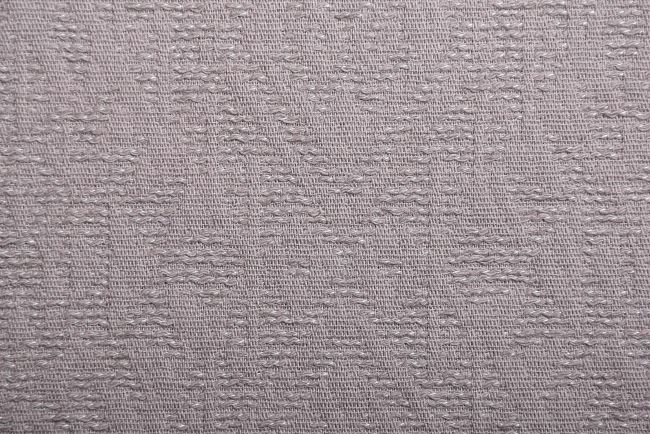 Costume fabric in dark beige color with a plastic pattern of ornaments TI484
