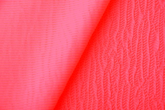 Functional knitwear in bright pink color with a plastic pattern of stripes MO033712