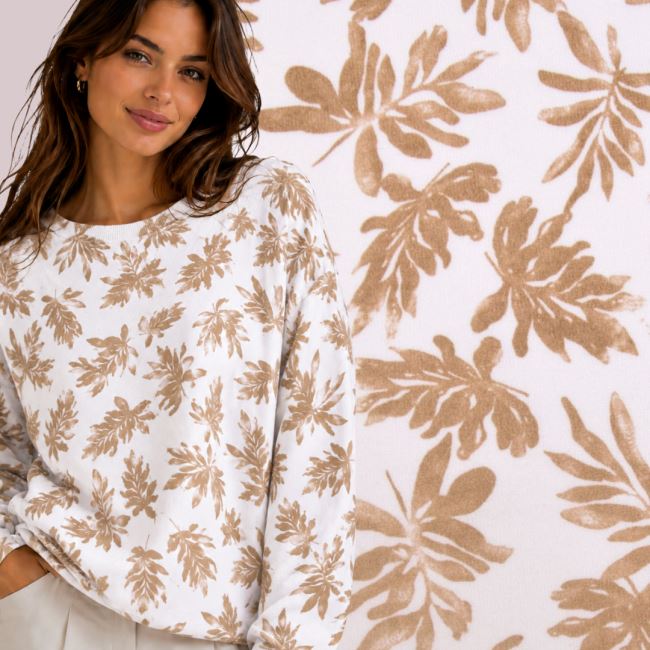 Weaker knit fabric in cream color with leaf print MAR044
