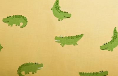 1 m of cotton knitwear in beige color with crocodile print DS-KUP115