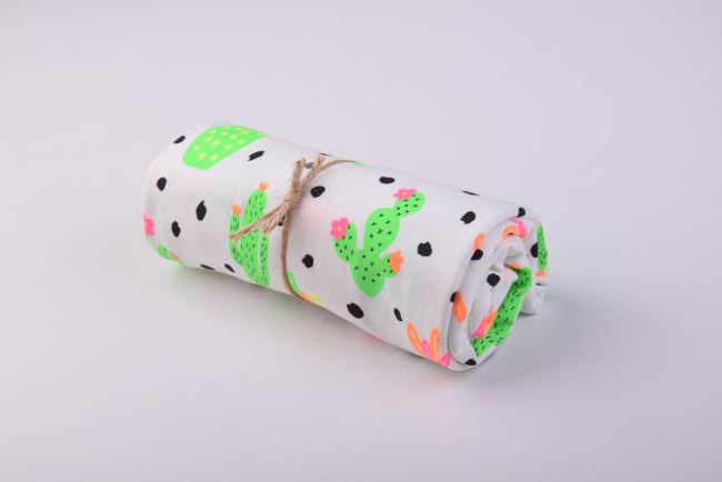 Roll of cotton knit in cream color with neon cactus print RO13626/050
