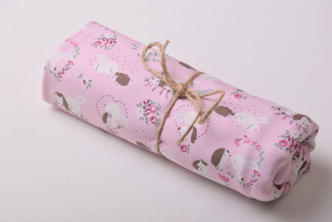 Roll of cotton knit in pink color with animal print RO19558/012