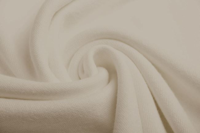 Knitted fabric in light beige color CC-13528/2023CL.2