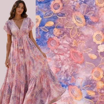 Cotton fabric with a batik look with a plastic pattern of embroidered flowers 22914/825 Cotton fabric with a batik look with a plastic pattern of embroidered flowers 22914/825