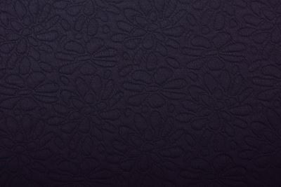 Thicker knit in black with a plastic flower pattern N9999/003